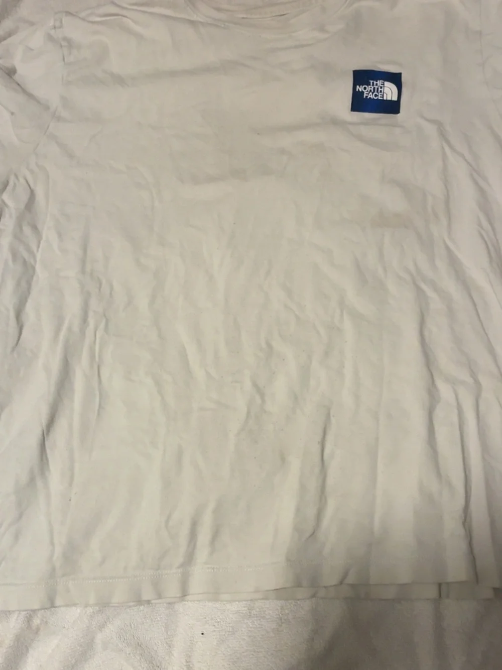 The North Face White Short-Sleeve Tee with Blue Logo Pocket